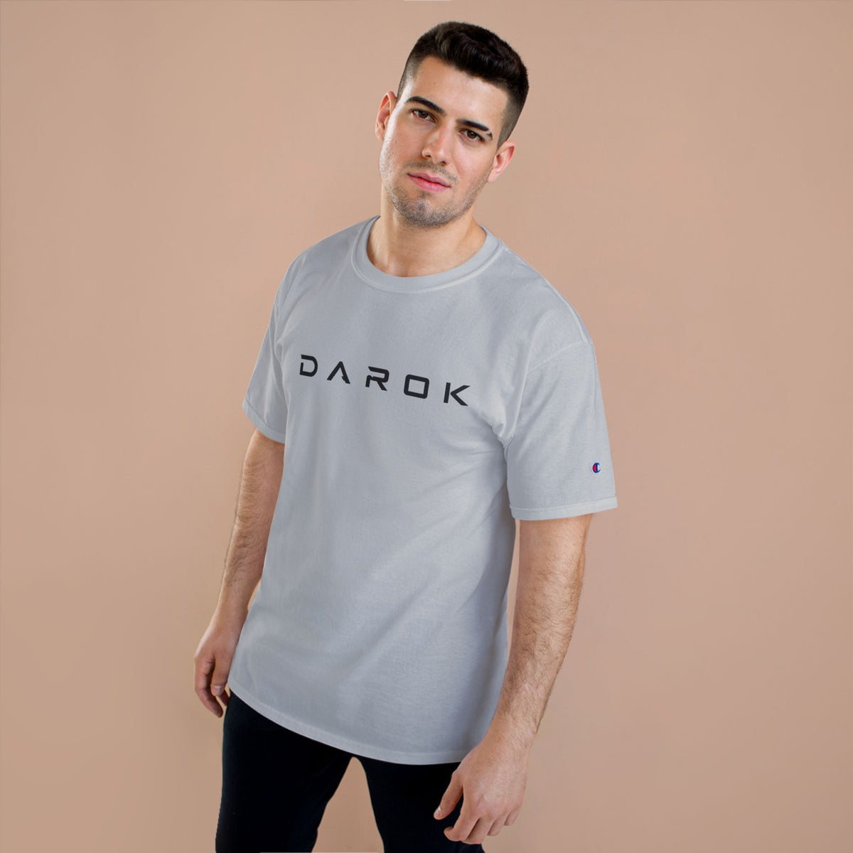 Champion T-Shirt — DAROK Minimal Logo Tee with Vertical “Defy Conquer Repeat” Back Print